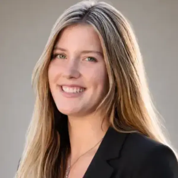 Headshot of Chiara Bilant. She is a white female with light brown hair wearing a black blazer.